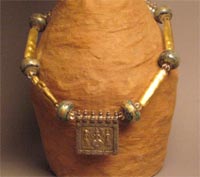 Ganesh Amulet and Sogdian Gold Figure with Gold Venetian Beads and Lampwork Beads